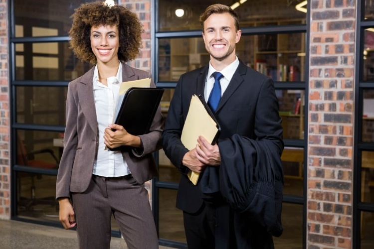 Lawyer Smiling With His Client